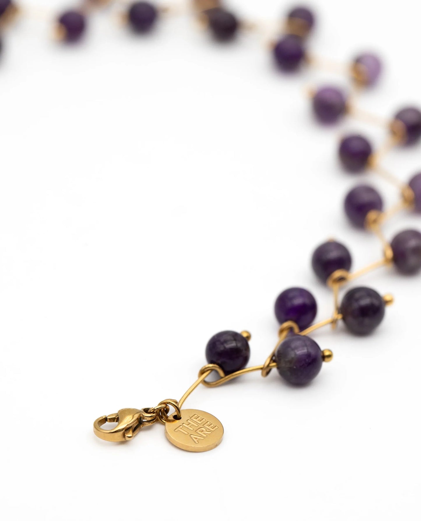 COLLAR ZIGY AMETISTA · ACERO BAÑO ORO